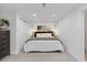 Basement bedroom featuring carpet, closet space, and stylish decor at 8674 Carr Loop, Arvada, CO 80005