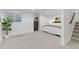 Finished basement bedroom with ample lighting, neutral carpet, and closet at 8674 Carr Loop, Arvada, CO 80005