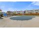 Community pool area, covered in preparation for the off-season at 8674 Carr Loop, Arvada, CO 80005