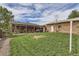 Large backyard with patio and storage shed at 1325 Elder St, Denver, CO 80221