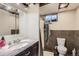Basement bathroom with stall shower and vanity at 1325 Elder St, Denver, CO 80221
