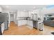 Bright kitchen features a tiled backsplash, stainless steel appliances, and sleek countertops at 11853 Trail View Ln, Parker, CO 80134