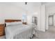 Bright main bedroom with an ensuite bathroom and a walk-in closet at 11853 Trail View Ln, Parker, CO 80134