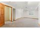 Basement has carpet, recessed lighting, and a storage closet at 11932 W 56Th Cir, Arvada, CO 80002
