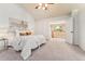 A different view of the main bedroom with an open doorway to a stairwell at 11932 W 56Th Cir, Arvada, CO 80002