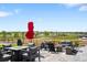 Enjoy the outdoor patio space with a fire pit and comfortable seating, perfect for entertaining guests at 15640 Spruce St, Thornton, CO 80602