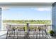 Relax on this outdoor deck with bar-height seating and enjoy the expansive view of the lush neighborhood at 15640 Spruce St, Thornton, CO 80602