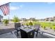 Inviting outdoor patio area featuring a fire pit and comfortable seating, great for entertaining at 15640 Spruce St, Thornton, CO 80602