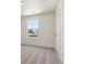 Bright bedroom featuring carpet and a window with a view at 27480 E Cedar Pl, Aurora, CO 80018