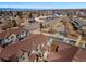 A panoramic view showing the neighborhood homes against the backdrop of distant mountains at 7352 E 7Th Ave # 7, Denver, CO 80230