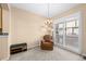 Cozy dining area with natural light from the large sliding glass door at 7352 E 7Th Ave # 7, Denver, CO 80230