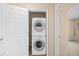 Convenient laundry closet with stacked washer and dryer at 7352 E 7Th Ave # 7, Denver, CO 80230