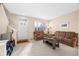 Cozy living room with neutral colors, plush furniture, and a welcoming atmosphere at 7352 E 7Th Ave # 7, Denver, CO 80230