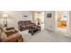 Inviting living room with comfortable furniture, neutral colors, and plenty of natural light at 7352 E 7Th Ave # 7, Denver, CO 80230