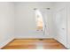 A light and bright bedroom with hardwood floors and a lace curtain at 3419 Stuart St, Denver, CO 80212