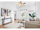 Living room showing bright natural light and hardwood floors at 3419 Stuart St, Denver, CO 80212