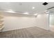 Finished basement with carpet, recessed lighting, and open layout at 3332 N Vine St, Denver, CO 80205