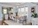 Bright dining area with a view to kitchen and modern decor for Gathering meals at 3332 N Vine St, Denver, CO 80205