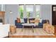 Cozy living room with large windows, comfortable seating, and stylish decor for relaxed living at 3332 N Vine St, Denver, CO 80205