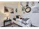 Bright bedroom featuring Parisian-themed decor and comfortable furnishings at 9510 E Florida Ave # 3055, Denver, CO 80247
