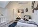 Cozy bedroom with Parisian-themed decor and comfortable furnishings at 9510 E Florida Ave # 3055, Denver, CO 80247