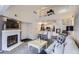 Bright living room with fireplace and soaring ceilings offers a cozy space at 9510 E Florida Ave # 3055, Denver, CO 80247