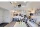 Open concept living space with soaring ceilings and sleek, modern decor at 9510 E Florida Ave # 3055, Denver, CO 80247