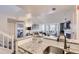 Open concept living space with soaring ceilings and sleek, modern decor at 9510 E Florida Ave # 3055, Denver, CO 80247