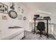 Loft space with a desk, bed, and ample lighting, suitable for a home office at 9510 E Florida Ave # 3055, Denver, CO 80247