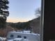 Scenic landscape showcasing the natural beauty of the surrounding mountains and trees from an open window at 1805 Hidden Valley Rd, Sedalia, CO 80135