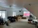 Cozy living room with a large window and neutral tones at 1805 Hidden Valley Rd, Sedalia, CO 80135