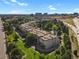 A gorgeous aerial view of the condo complex, with beautiful ponds and greenery at 7000 E Quincy Ave # 302, Denver, CO 80237