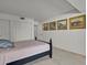 Neutral carpet and built-in closet provide style and convenience to this bedroom at 7000 E Quincy Ave # 302, Denver, CO 80237