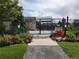 Beautiful community pool with secure fencing and colorful landscaping at 7000 E Quincy Ave # 302, Denver, CO 80237