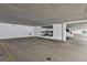 Bright parking garage with parking stall 302A, as well as a partially visible silver sedan at 7000 E Quincy Ave # 302, Denver, CO 80237