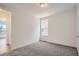 Bedroom with a window and neutral carpet at 747 Raindance St, Erie, CO 80516