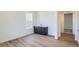 Bright office space with wood floors, a window with views, and neutral walls at 747 Raindance St, Erie, CO 80516