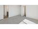 Bedroom with carpet, white walls, and natural light at 9332 Bahama Ct, Commerce City, CO 80022