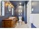 Stylish bathroom with a wood vanity, elegant fixtures, and crisp, clean design at 629 Bellaire St, Denver, CO 80220
