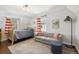 This is a nicely staged bedroom with great natural light at 629 Bellaire St, Denver, CO 80220