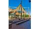 An attractive outdoor plaza with a large shade structure and comfortable seating at 629 Bellaire St, Denver, CO 80220
