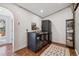 Convenient laundry room with stacked washer and dryer and adjacent exterior access at 629 Bellaire St, Denver, CO 80220