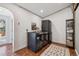 Well-equipped laundry room featuring modern washer and dryer units, ample space, and organized shelving at 629 Bellaire St, Denver, CO 80220