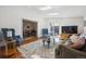 Bright and airy living room with large windows, comfortable seating, and an open floor plan at 629 Bellaire St, Denver, CO 80220