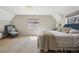 This is a beautifully staged main bedroom with great natural light and ample floor space at 629 Bellaire St, Denver, CO 80220