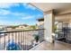 Inviting balcony with seating and open views of the surrounding neighborhood at 875 E 78Th Ave # 21, Denver, CO 80229