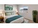 Staged bedroom with stylish furnishings, natural light and pleasing décor at 875 E 78Th Ave # 21, Denver, CO 80229