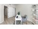 Well-lit office space with a comfortable chair, modern desk, and ample storage at 875 E 78Th Ave # 21, Denver, CO 80229