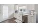 Eat-in kitchen features granite countertops, stainless steel dishwasher, and undermount sink at 9434 Ashbury Cir # 204, Parker, CO 80134