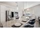 Modern kitchen with granite countertops, stainless steel appliances, and stylish pendant lighting at 9434 Ashbury Cir # 204, Parker, CO 80134